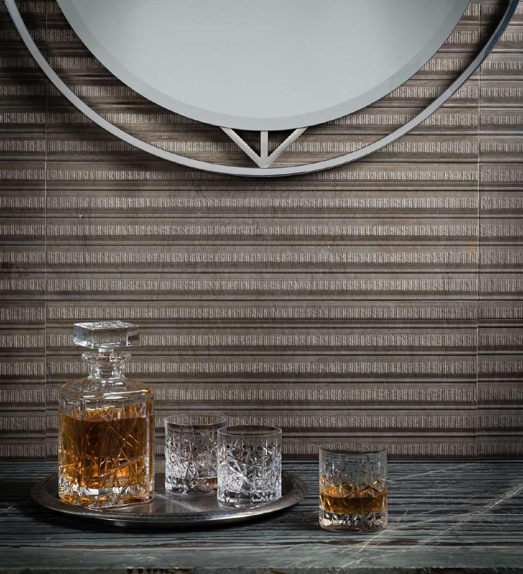 PANNELLI Evocative of classic wood paneling, Pannelli is a textured dimensional stone with a formal, old school appeal.