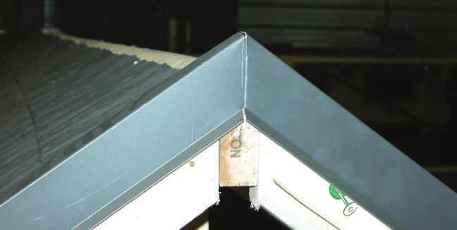 Cut the inner area of the first piece, and the drip edge to match the vertical plane at the ridge apex.