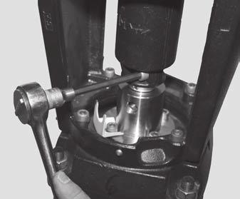 To free/remove the remaining coupling half, strike the upper edge of the coupling