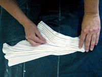 Place rubber bands at 1 intervals along the pleats - the tighter you pull, the