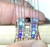 of the loom, around and under the front, pass right to left through bead 5.