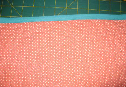the main layer on the top with right side facing up. Quilt the 3 layers if you wish. I stipple quilted mine in all over pattern.