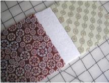 Using a ½ seam allowance, sew your two Pincushion Top squares to either side