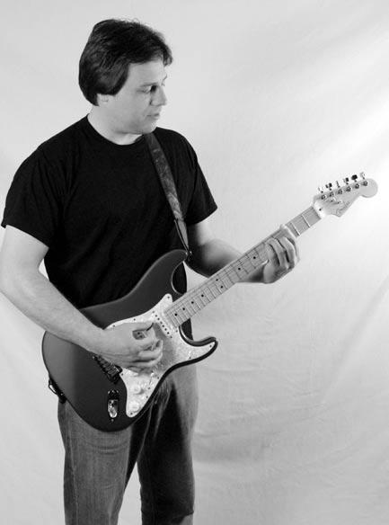 Holding Your Guitar: The easiest way to hold your guitar when first learning is to sit down. Most people sit when they practice and stand when they are performing.