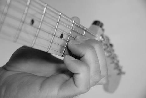 Finger Placement: When you place your fingers on the fretboard, make
