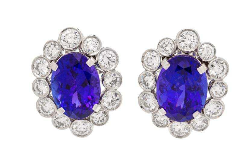 Lot 382 A Pair of Platinum, Tanzanite and Diamond Earclips, Van Cleef & Arpels, containing one oval mixed cut tanzanite weighing approximately 3.