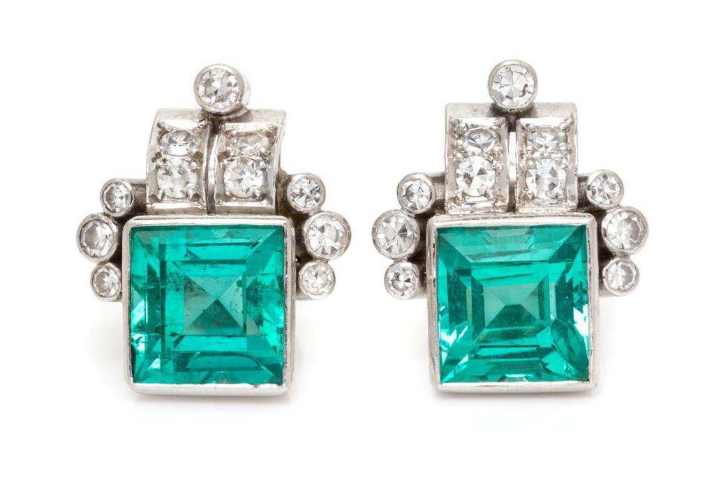 Lot 105 A Pair of Platinum, Emerald and Diamond Earrings, containing two square step cut emeralds measuring approximately 6.60 x 6.30 x 4.42 mm and 6.80 x 6.60 x 4.