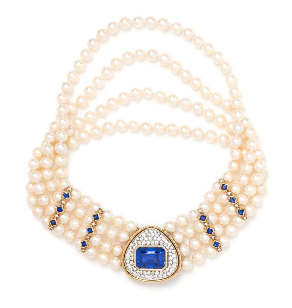 Lot 327 An 18 Karat Bicolor Gold, Ceylon Sapphire, Diamond and Cultured Pearl Necklace, French, composed of a central shield form pendant containing an octagonal step cut sapphire measuring