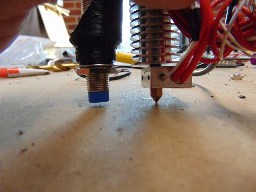 4. The probe should be mounted almost level with the print head using the 2 Jam Nuts supplied with the probe.