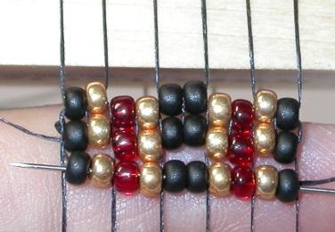 Push the beads up and into position with 2 beads between