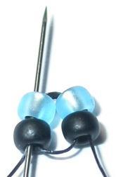 seed beads: 1 black, 2 blue, 1 black. 4.