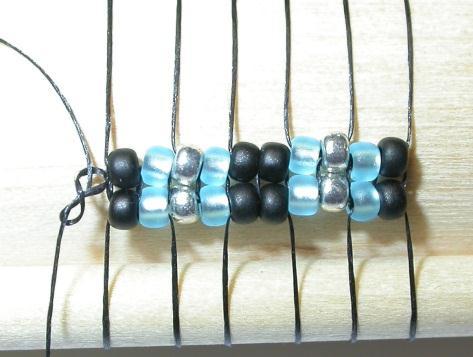 back and pass right to left through the upper beads (silver, blue) Continue