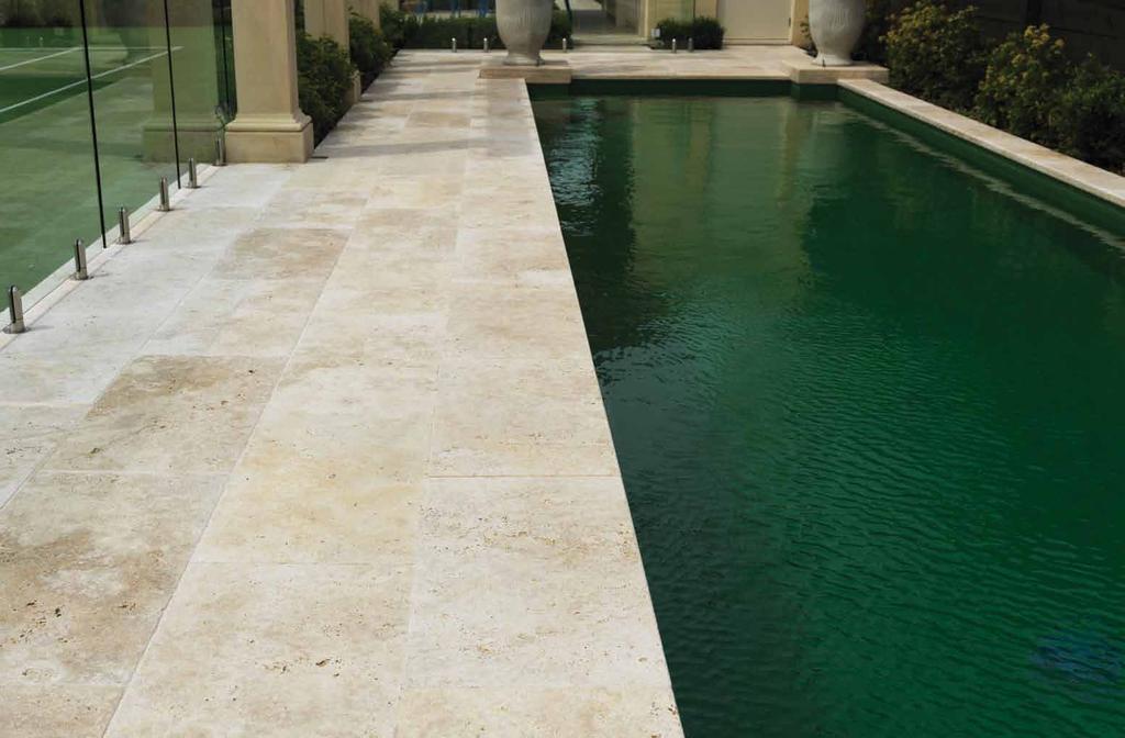 TUMBLED WALNUT TRAVERTINE APPLICATION Architecturally designed landscaping feature, 1m x