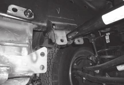 Be sure to insert the cap screws through the stabilizer brackets pointing inward from outside the vehicle to ensure access to the M10 cap screws for later tightening. 6.
