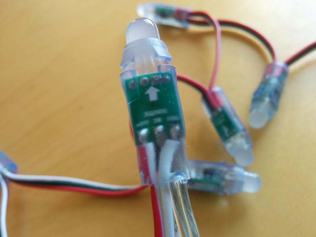 An LED strip with two transparent wires.