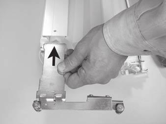 You may use an extension bracket to mount the stationary rail away from the wall. An extension bracket may be necessary if you used spacer blocks with the mounting brackets.