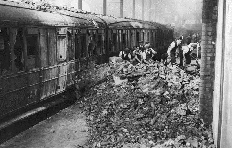 Picture 6 Workers clearing the debris after a German air raid on a railway station, 9 September 1940.