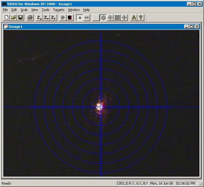 The sample is aligned when the laser light scattering off of your sample surface is centered in the video camera. The lines from the laser, video camera, and X-ray beam all focus at that spot.