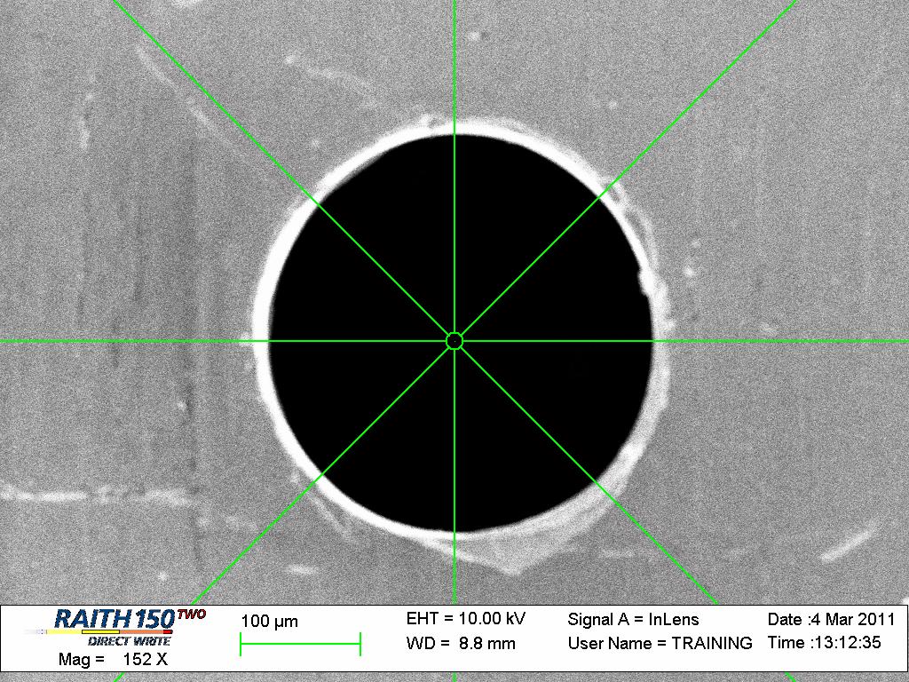 Figure 27 (a) Stage Control (Positions tab) window in the Adjustments menu, (b) Faraday cup orifice. 27. Ensure that the crosshairs of the SEM image are well centered on the Faraday cup.