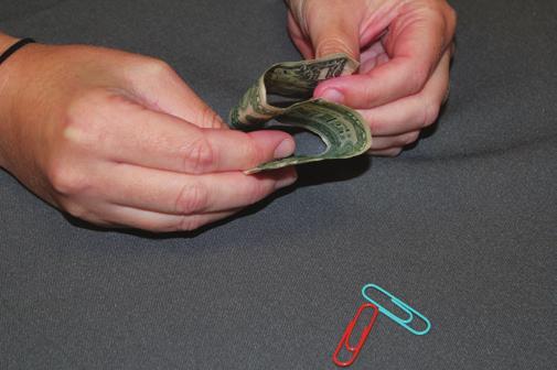 The Jumping Paper Clip WHAT YOU LL NEED: a one dollar bill and two
