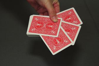 Magic Card Trick WHAT YOU LL NEED: one deck of cards STEP 1: Hold the deck of cards upright, so the card