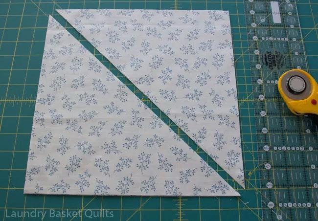 From the light 1/3 yard block background fabric cut 2 squares 11-1/4, then cut once diagonally