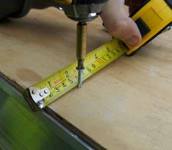Insert the stud into the pre-drilled hole and bolt together.