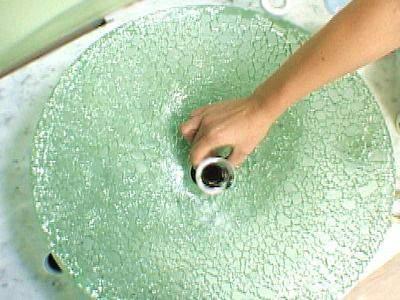 It is important that the hole for the drain through the top of the counter is not too large. It needs to be just big enough to allow the drain's pipe through.
