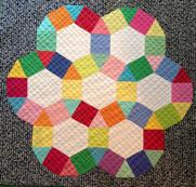I have been working on my English Paper Piecing Circles, they are a little harder than the hexagons. You have to be a little more picky on the corners to get them just right.