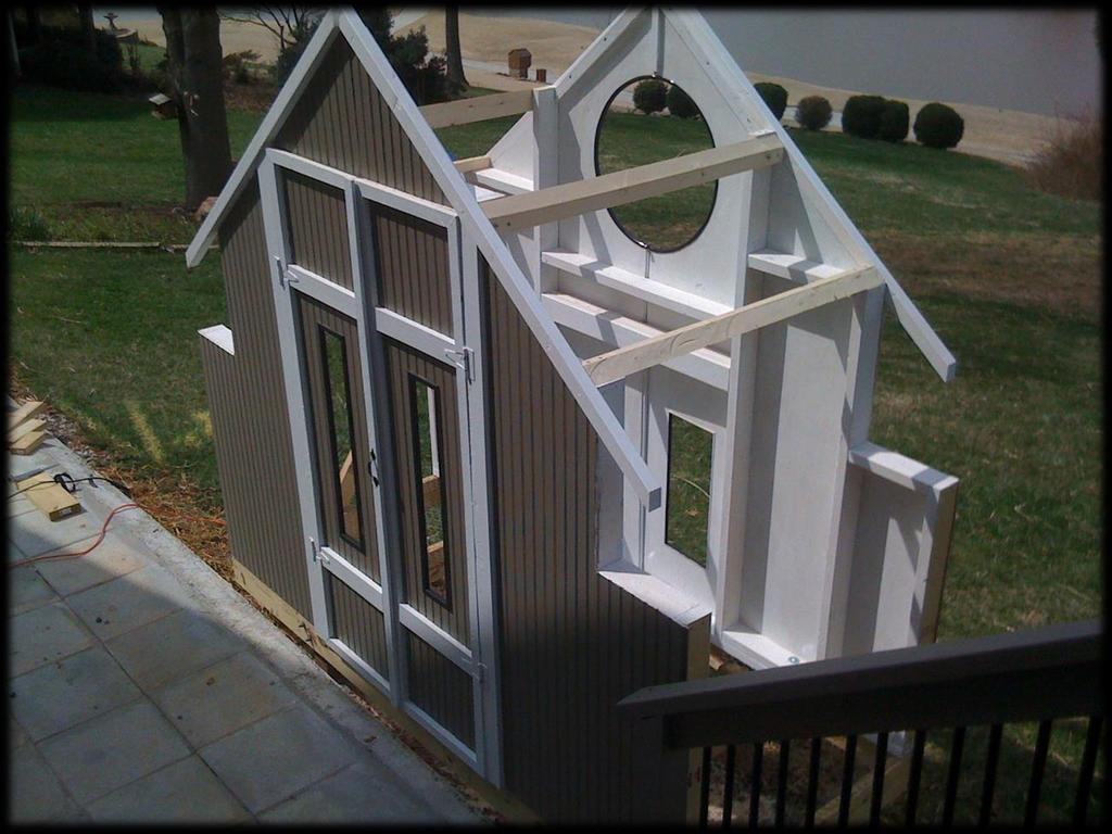 roof sections from the same beaded pine plywood and painted the inside surfaces white on the lawn with a roller for speed.