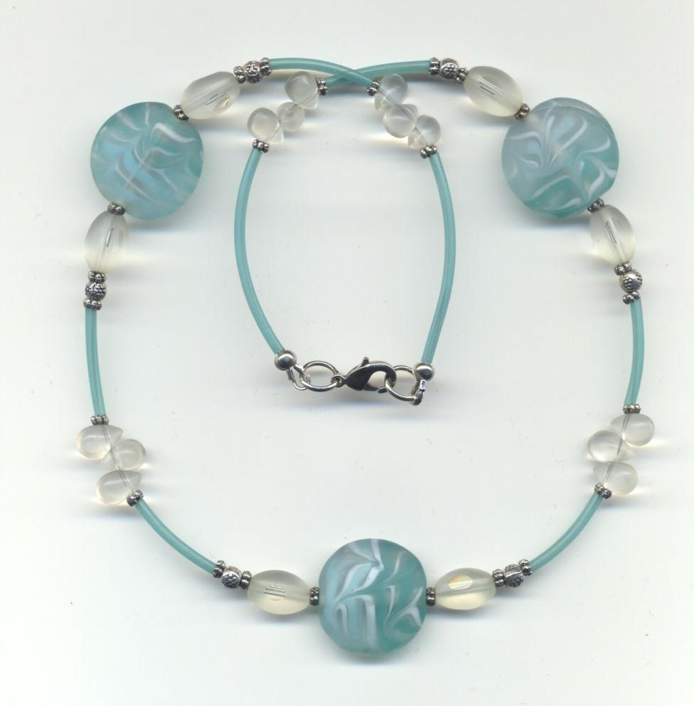 Blue and turquouse necklace with frosted glass and Tibetan spacer beads.