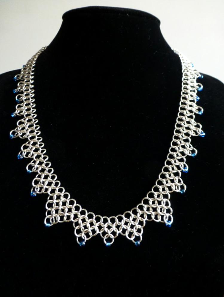 with feature stones in Sapphire seed beads.