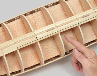 When the glue is dry, remove any of the plank that overlaps