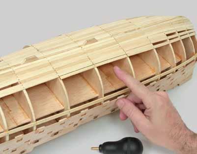 c Glue and nail a plank to fit next to the
