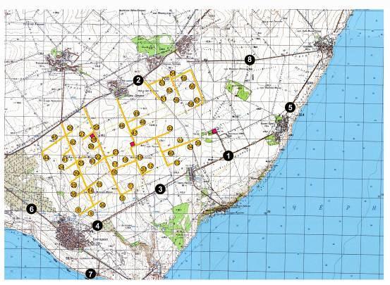 Figure 1. Location of the plot of the wind farm turbines (numbered yellow dots) radar beam (the arrows, centred on the red cross) and the visual observation points (numbered black dots).