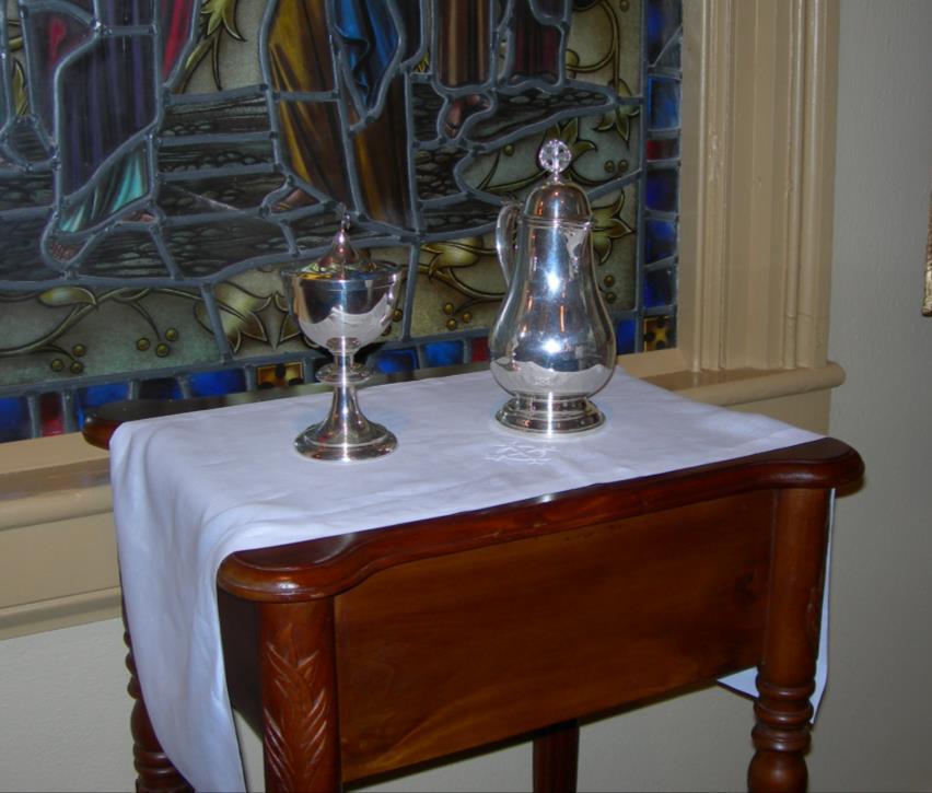 back and point to the front. Place SILVER OVAL TRAY CENTER FRONT of Table with small bag of 50 wafers. Cruets, Chalices, Ciborium, Lavabo bowls, wafers, trays, etc.