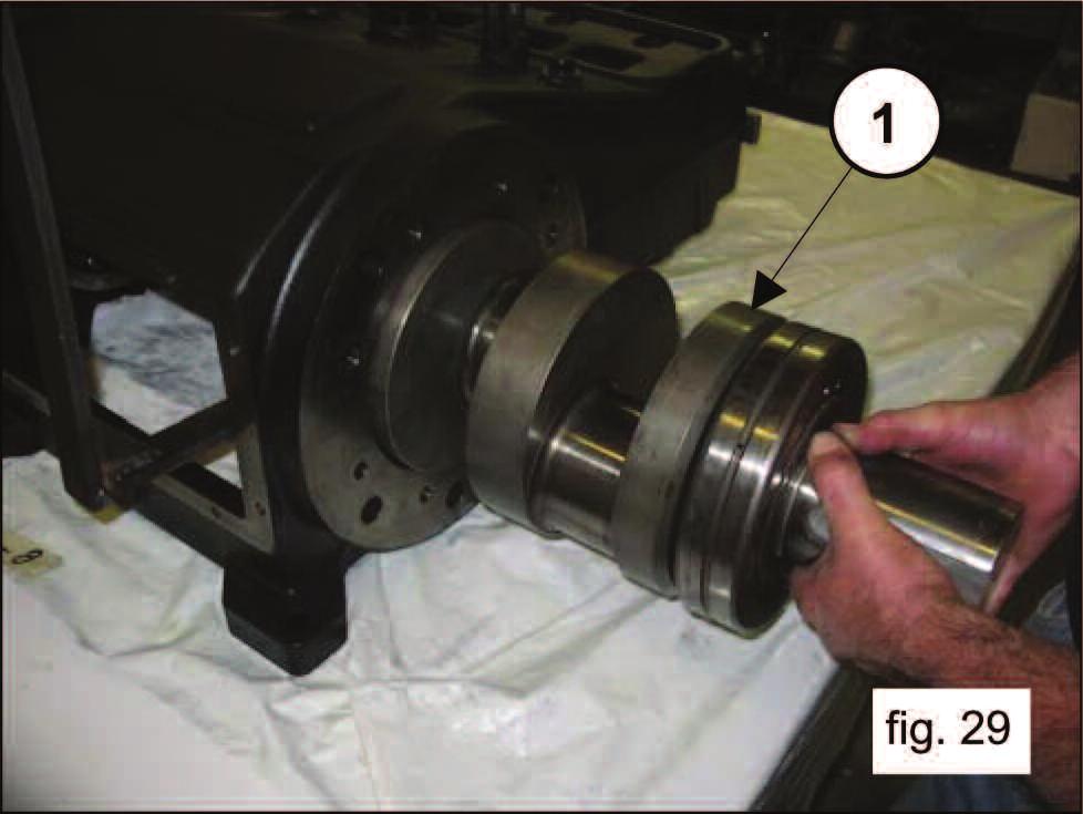 Remove the shaft and the bearing (1, fig. 29).