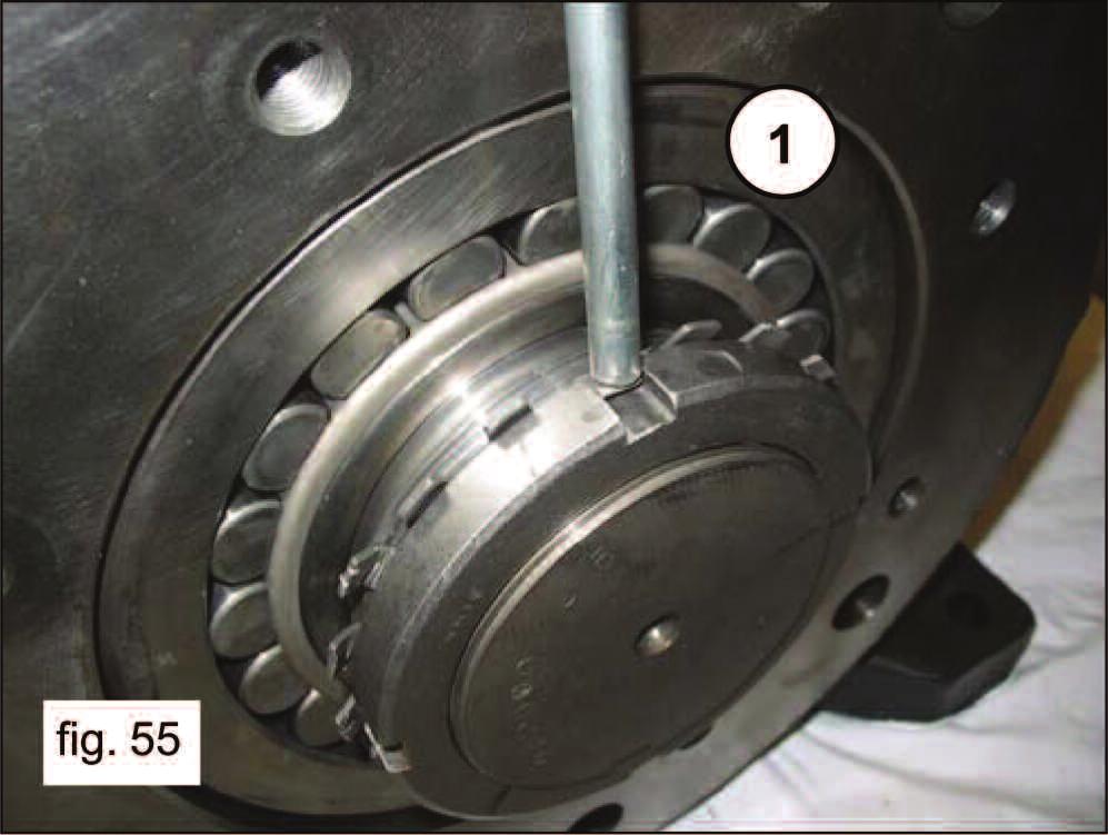 58) being sure that the split bearings reference key is positioned in the appropriate seat on the cap (1, fig. 58).
