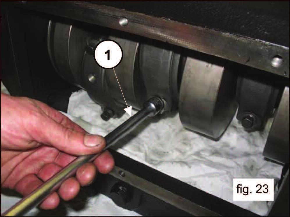 Unscrew the connecting rod screws (1, fig. 23).