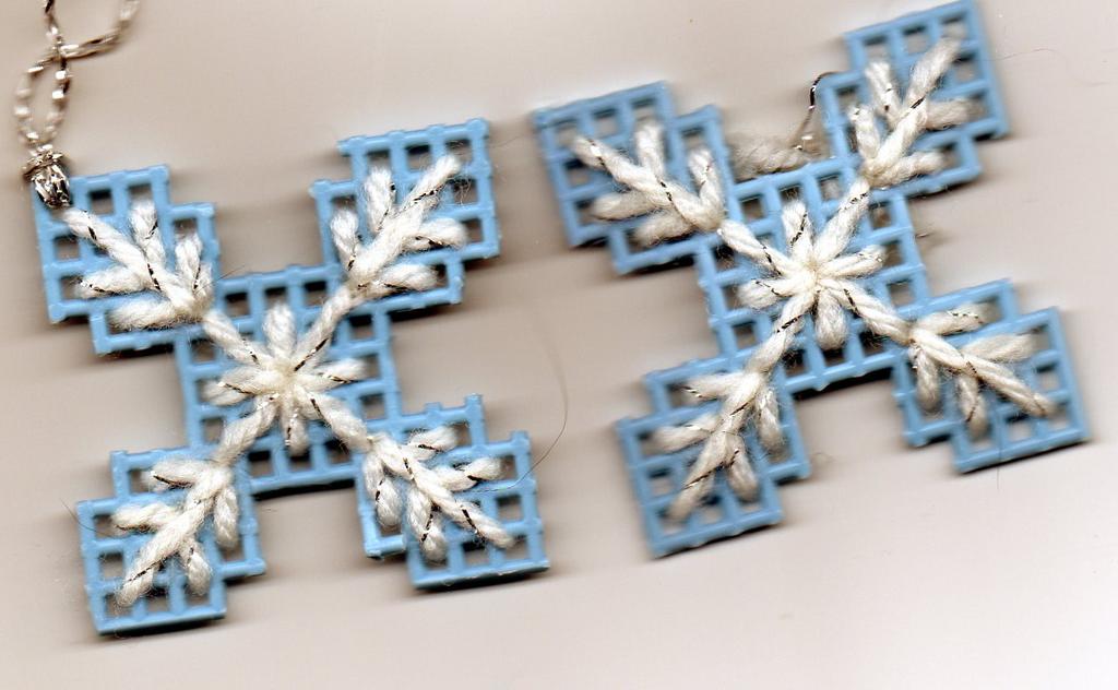 Snowflake Cut two pieces of plastic canvas11 squares by 11