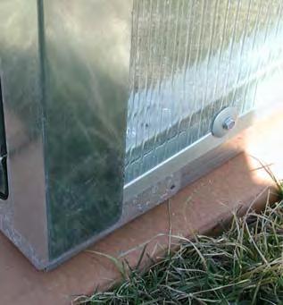 Edge of Polycarbonate Angled End Panel Edge of Flashing under the