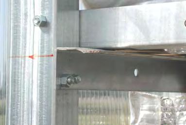 There are two (2) cross braces attached to each interior vertical support for each shelf (Fig. 2). See the photos. 4.