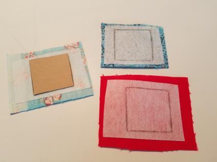 Place one fusible interfacing square to the wrong side of each fabric square. Fuse, following interfacing manufacturer s directions.