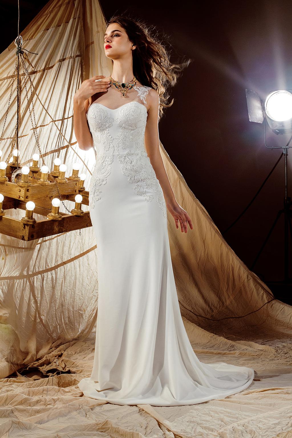 Vanessa Wholesale price: $310 Straight cut dress, made of satin with a little train, perfectly embraces the silhouette of the bride.