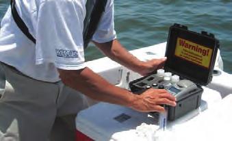 Water-Column Monitoring A response worker takes samples.