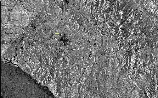 Lesson 3.1 Enhancing Image Data Figure 3.3 radarsat.pix with root enhancement With the root enhancement applied, a T-shaped object is revealed near the left center of the image.
