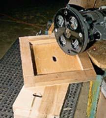 Wooden Cleats: Screw 1 1 2"-square cleats to the inside edge of all four rails and rest the box spring on those.