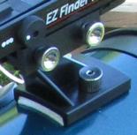 3. Cut a notch in the left side of the battery cover on the EZ Finder. 4. Cut a 3/4 inch diameter disk out of a large rubber washer. If the washer is 1/16 inch thick, cut two disks.