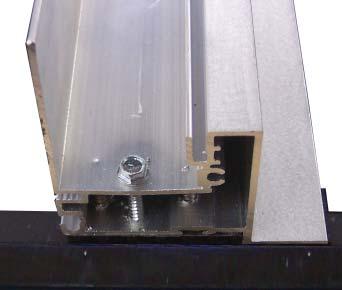 Slide nailing fin into each jamb nosing where needed (Fig. 6). Apply the frame nosing corner seals to the top corner (45 angle) each side jamb/post interlock. (Fig. 7) Attach the side jamb(s) to the head using the screws supplied in the Frame Assembly screw package.