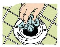The nuts are located beneath the flange at the rear of the toilet bowl. Figure shows how to work with these. With the bolts out, you can lift the tank clear of the bowl.